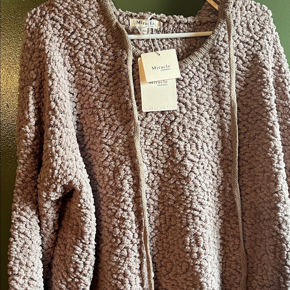 MIRACLE. Boutique brand Miracle sweater NWT